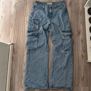 Women’s high rise light wash cargo jeans size 27